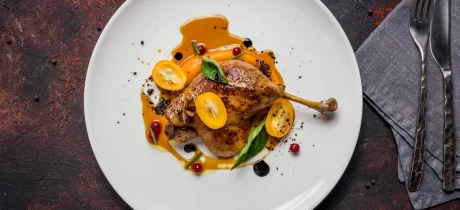 Gekonfijte eendenbout met sinaasappeljus