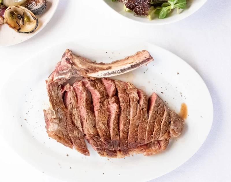 Côte de boeuf met zelfgemaakte knoflookolie