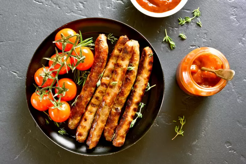Saucisses grillées au barbecue Saucisses grillées au barbecue