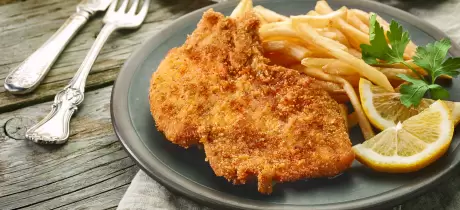 Wienerschnitzel met ovenfriet